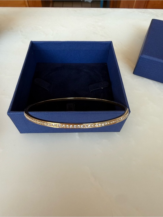 Swarovski Jewelry - Swarovski Gold Tone Round Bangle Bracelet